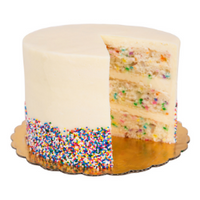 birthday party cake with slice out 